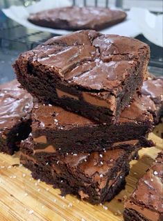 chocolate brownies stacked on top of each other