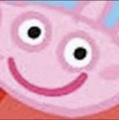 a pink peppo pig with big eyes and a smile on it's face