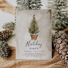 a holiday party card with pine cones and a potted christmas tree on the front