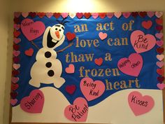 a bulletin board with hearts and a snowman