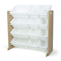 a wooden shelf with white bins on it