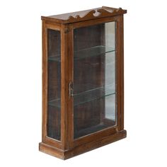 an old wooden display case with glass doors on the front and bottom shelves, isolated against a white background