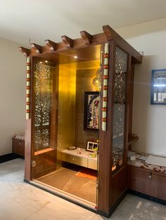 the inside of a steam sauna in a room with wood trimmings and glass doors