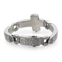 Crafted from high-quality stainless steel, our Men's Stainless Steel Heavy Cross Bangle Bracelet in Silver – is a bold and stylish accessory that combines durability with a touch of spiritual elegance. This bracelet made by Innovato Design, features a substantial cross design, making it a symbol of strength and faith. The silver finish adds a classic touch, making it versatile for various occasions. Elevate your style with this statement piece that seamlessly blends modern aesthetics with timeless significance.   Key Features:     Heavy cross bangle bracelet for men.  Crafted from durable and 316L high-quality stainless steel.  Width: 8.66in (22cm), Width: 11mm, Weight: 100g  Stylish silver finish for a classic and versatile look.  Symbolic of strength and faith.  The perfect accessory for Dolphin Bracelet, Wood Inlay Rings, Symbol Of Strength, Punk Accessories, Bangle Silver, Bracelet In Silver, Masonic Ring, Wooden Sunglasses, Gothic Rings