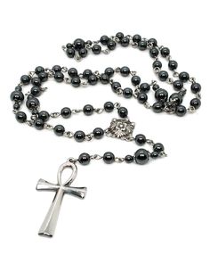 Made to Order! Available in rosary form at long last! An enduring staple of the goth subculture, this ankh rosary is a goth jewelry cornerstone for your wardrobe. The chain construction is kept simple to allow the pendant to shine. This ankh is made of stainless steel and will not tarnish over time. The sturdy construction and simple beauty of this rosary make a reliable piece that you won't want to leave home without. The shiny steel will contrast perfectly with all manner of gothic attire. At Gothic Rosary Necklace, Trad Goth Jewelry, Ankh Rosary, Gothic Baddie, Goth Rosary, Gothic Accessories Jewellery, Baddie Jewelry, Gothic Rosary, Gothic Attire