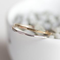 This stacking ring is a simple but yet beautiful jewel for your inner minimalist. It is a gentle and delicate piece, which you may wear alone or stacked. It is a great every-day jewel which will perfectly suit any occasion and any outfit.The ring is 0.8-0.9 mm thick. It's relatively sturdy for such a skinny band. Choose the material for the ring (sterling silver or 9k gold).You may order the ring of any size. If you are not sure about the size, this will be helpful: findmyringsize.com/If you wan Faceted Ring, Stackable Ring, Slovakia, Stacking Ring, Ring Sterling Silver, Stackable Rings, Stacking Rings, Sterling Ring, Silver Band