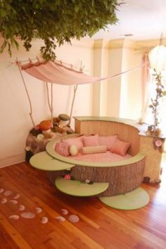 an image of a living room with pink furniture and accessories on the floor, as well as pictures of teddy bears