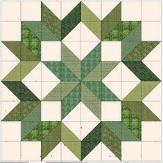 a green and white quilt block with an arrow pattern on the front, in two different colors