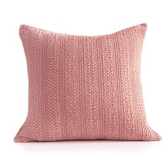 a pink pillow on a white background