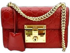 Elegant Red Bags With Lock, Gucci Leather Bags With Lock, Designer Gucci Bag With Lock, Luxury Gucci Bag With Lock, Luxury Red Bag With Lock, Luxury Red Shoulder Bag With Turn-lock Closure, Red Rectangular Shoulder Bag With Turn-lock Closure, Gucci Red Shoulder Bag With Gold-tone Hardware, Red Gucci Shoulder Bag With Gold-tone Hardware