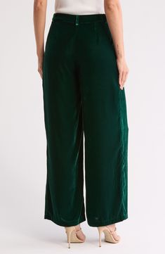 These polished, floor-sweeping, wide-leg pants are crafted from sumptuous velvet for an elevated look and feel. 30" inseam; 13" leg opening; 15 1/4" front rise Zip fly with button closure Front slash pockets 100% polyester Machine wash, tumble dry Imported Polished Floor, Velvet Wide Leg Pants, Kids Uggs, Man Up, Fall Accessories, How To Make Shoes, Cold Weather Accessories, Short Rompers, Dress Romper