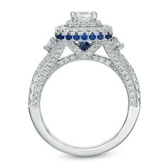 a diamond and blue sapphire engagement ring