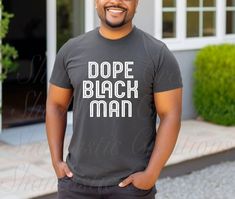 Spread positivity with our "Dope Black Men" tshirt. Made with premium materials, this tee combines comfort with a powerful message self-affirmation. Celebrate Black excellence and embrace you identity with confidence. Whether you're hanging out with the guys or kicking it at home, this shirt is perfect for expressing prided empowerment. It also makes a thoughtful gift for the man in your life who exudes strength and resilience during any occasion. Black men should be celebrated all throughout th Black T-shirt For Streetwear, Father's Day Black Graphic Tee, Black T-shirt For Birthday And Father's Day, Black T-shirt With Lettering For Father's Day, Father's Day Black Relaxed Fit T-shirt, Black Relaxed Fit T-shirt For Father's Day, Black Unisex T-shirt For Father's Day, Man Shirt, Men Tshirt