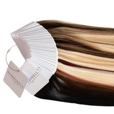 For matching our Hand Tied Wefts, Bombshell Wefts, and Clip-Ins Color Rings are a direct sample of the quality and luxury of Bombshell hair extensions 16-inch color swatches Please note, professional color line levels do not directly correlate to our color swatch numbers *Be sure to store your color ring in a drawer or covered area, away from heat & light - as exposure to light can cause the swatches to fade over time and potential of inaccurate matching For our other extension methods: Machine Bombshell Hair, Hand Tied Wefts, Hair Extension Brands, Color Rings, Blush Rose, Rose Hair, Color Swatch, Blush Roses, Color Lines