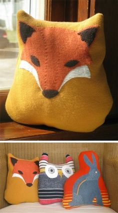 two pillows with different designs on them and one has a fox head in the middle