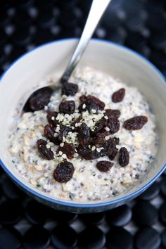 a bowl filled with oatmeal and raisins