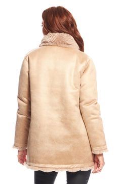 Fluffy faux fur with bevel-cut pelted lines means luxurious softness in this reversible coat that has a sleek faux-leather side for twice the texture. 31" length Stand collar Lined 100% polyester with 100% polyester faux-fur reverse Dry clean Imported Beige Shearling Outerwear With Faux Fur Lining, Beige Shearling Fur Coat With Faux Fur Lining, Beige Outerwear With Faux Fur Lining, Beige Long Coat With Faux Fur Trim, Beige Long Coat With Faux Fur Lining, Long Mink Coat With Faux Fur Lining, Mink Long Coat With Faux Fur Lining, Mink Color Long Coat With Faux Fur Lining, Nora Fleming Minis