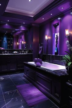 a bathroom with purple lighting and a large bathtub in the middle of the room