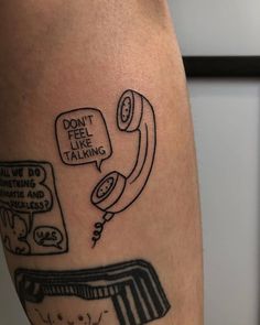 a man's leg with a drawing on it that says don't feel like talking