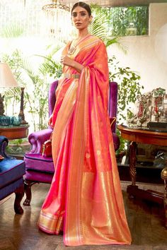 Product Features: Saree Color: Peach Blouse Color: Peach Saree Fabric: Silk Blend Blouse Fabric: Silk Blend Saree Type: Banarasi Saree Work: Woven Saree Pattern: Woven Design Saree Print : Floral Blouse Print Or Pattern: Geometric Saree Border: Woven Design Saree Discription: 5.5 mtr saree And 0.8 mtr blouse Package Contain: 1 Saree 1 Blouse Wash: Dry Clean Occasion: Traditional/Festive Product: Saree Disclaimer: There will be slight difference in digital to actual image Peach Saree, Orange Saree, Raw Silk Saree, Peach Blouse, Party Sarees, Half Sleeve Blouse, Kanjivaram Sarees, Work Sarees, Silk Sarees Online