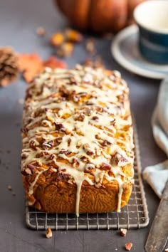 a loaf of bread sitting on top of a cooling rack