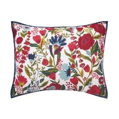 a red and blue floral pillow on a white background