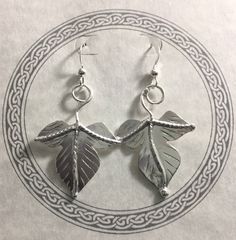 I've fabricated these woodland inspired leaf earrings to be reminiscent of Autumnl, creating two detailed autumn leaves which dangle from ear wire hook style earring components. The leaves are approximately one inch in size and the dangle earrings add another inch for a total length of two inches when worn. I've made these from 22 gauge thick sheet so it's plenty strong and durable with a nice weight when worn, but not too overwhelming to pull or tug the ear lobes. **The last image I've shown th Handmade Leaf-shaped Earrings, Nickel-free Leaf-shaped Nature-inspired Earrings, Handmade Leaf-shaped Nature-inspired Earrings, Woodland Autumn, Woodland Earrings, Leaf Bracelet, Autumn Leaf, Earrings Simple, Simple Earrings