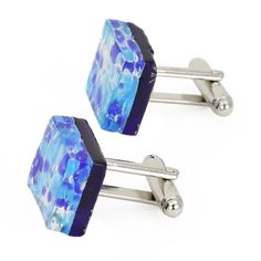 A perfect example of the centuries-old Murano glass tradition, this set of Murano cufflinks is for a man who values elegance and style. Made by hand in Venice using the famous lampworking technique, these Murano cufflinks feature rich colors, intricate patterns and occasional millefiori inclusions, making them perfect for the office, formal event, or just everyday chic. These cufflinks are a great gift for any man with appreciation for European flair and Italian fashion. Each cufflink measures 1 Formal Blue Glass Jewelry, Luxury Glass Jewelry For Formal Occasions, Elegant Blue Cufflinks For Gift, Murano Glass Jewelry, Blue Dangle Earrings, Glass Christmas Tree Ornaments, Everyday Chic, Handmade Handbags, Christmas Figurines