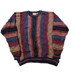 Vintage 90s Coogi Style Cotton Traders Crewneck Sweater - Classic Retro Knit Dive into the nostalgia of the 90s with this eye-catching vintage Coogi style crewneck sweater! Inspired by the iconic designs of Coogi Australia, this sweater features the same bold patterns and vibrant colors that defined an era. Perfect for fashion lovers who appreciate unique, statement pieces. Features: Era: 1990s Style: Coogi-inspired Material: High-quality acrylic blend (Soft, warm, and durable) Design: Multicolo 90s Style Cotton Sweater For Fall, 90s Style Knitted Crew Neck Sweater, 90s Style Knitted Tops For Fall, 90s Knitted Tops For Fall, 90s Style Knit Sweater For Fall, 90s Style Long Sleeve Fall Sweater, Vintage Multicolor Sweater For Fall, Vintage Fair Isle Pattern Tops For Fall, Vintage Fair Isle Tops For Fall