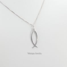 "The minimalist, dainty Fish symbol, Ichthus Pendant, is made of Sterling Silver and is an excellent gift for Christians. * Material: 925, Sterling Silver * Finish: High Polished Rhodium Plating or 18K Gold Plating. * Height: 28 mm (1.1 \") without the bail 29 mm (1.14\") with the bail. * Width: 10 mm (0.4\") * Chain Length Options: 16, 18, 20\" * Please select the chain length when you are placing your order. * All our Sterling Silver Jewelry is tarnish-resistant. They are either rhodium or 18K Jesus Fish Symbol, Minimalist Necklace Silver, Fish Symbol, Minimalist Necklace, Necklace Sterling Silver, Jesus Fish, Sterling Silber, Gold Plating, Chain Length