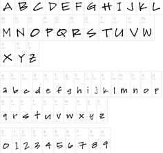 the upper and lower case of an old english typewriter, with letters in black ink