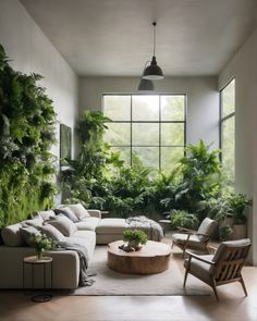 a living room filled with lots of green plants