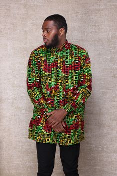 This is a handmade classy African print shirt for men, it's vibrant colors and fitting makes you more elegant, classy, charming, confident and shows your masculine features. Our ankara shirt treads the line between smart and casual, making it a great item for in-between days. Wear with jeans or smart trousers or make it suited to business settings with a contrasting jacket. Suitable for most outings, dates church, parties, business meetings, birthdays and birthday photo shoots, anniversaries etc Patterned Long Sleeve Shirt With Vibrant Print, Casual Long Sleeve Shirt With Unique Print, Green Long Sleeve Shirt With Graphic Print, Green Long Sleeve Shirt With Abstract Print, Multicolor Long Sleeve Shirt With Vibrant Print, Casual Long Sleeve Shirt With Colorful Pattern, Casual Long Sleeve Shirt With Vibrant Print, Latest Ankara Top Styles, African Print Shirts For Men