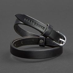 A thin women's black leather belt will perfectly complement a modern women's wardrobe. The belt is made of a single piece of very durable smooth leather.The belt is equipped with a simple classic buckle with rounded corners. The buckle is removable, which makes it possible to adjust the length of the product. The length of the belt excluding the buckle is 43.3 inches.This model is created for people who love the simplicity of classics, without unnecessary details and unnecessary elements. It can Black Leather Belt, Unique Bags, Women's Wardrobe, Handmade Accessories, Mens Belts, Natural Leather, Belts For Women, Single Piece, Rounded Corners