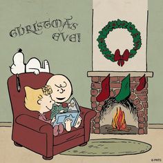 a charlie brown christmas card sitting on top of a chair next to a fire place