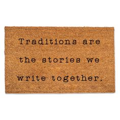 a door mat with the words,'traditionals are the stories we write together '