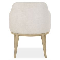 an upholstered white chair with wooden legs