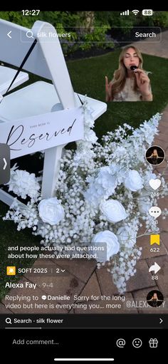 an image of a woman on her cell phone with flowers in the foreground and a sign that reads reserved