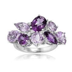 Beautiful cluster ring featuring a mix of african amethyst and amethyst stones set amongst smaller white topaz stones. The spark from the different stones gives off a natural shine. Crafted of fine sterling silver. Product Details Metal Type sterling-silver Metal Stamp 925-sterling Weight 5.14GR Length 14.21MM Width 26.5MM Height 5.8MM Stone Details Gem Type amethyst Number of Stones 2 Stone Color violet Stone Shape round-shape Total Weight 0.74 Setting Type prongs Stone Creation Method natural Iced Gems, Amethyst Stones, Real Jewelry, The Spark, Topaz Stone, Emerald Gemstone, Amethyst Stone, Opal Jewelry, Amethyst Ring