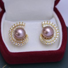 Elevate your elegance with our 11-12mm Freshwater Pearl Ear Studs adorned with sparkling cubic zirconia. The lustrous pearls, ranging from 11-12mm, exude timeless sophistication, while the cubic zirconia adds a touch of glamour. These exquisite ear studs effortlessly blend classic and contemporary, making them a radiant and versatile accessory. Material: Freshwater Pearl with 925 sterling silver Product Information Pearl Type Freshwater Pearl Origin China Shape Round Quality AAAA Size 11-12mm Na Luxury Cubic Zirconia Pearl Earrings For Formal Occasions, Luxury Pearl Earrings With Cubic Zirconia For Evening, Luxury Round Pearl Earrings For Evening, Luxury Baroque Pearl Earrings, Large Pearl Earrings, Freshwater Pearl Bracelet, Freshwater Pearls Earrings, Cz Earrings, Pearl Set