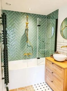 a bathroom with a sink, mirror and bathtub next to a wooden cabinet in the corner