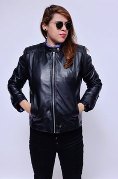 Leather jackets are a classic and versatile item that will always be in fashion. This leather jacket is timeless and classic. Made of 100 % authentic lambskin leather, this jacket will definitely become the "must" staple style statement piece for your wardrobe. XS S M L XL Chest 36 38 40 42 44 Shoulder 16 16 16.5 17 17 Waist 34 36 38 40 43.5 Womens Black Leather Jacket, Longline Jacket, Lambskin Jacket, Lambskin Leather Jacket, Biker Style, Black Leather Jacket, Sporty Look, Leather Jackets Women, Style Statement