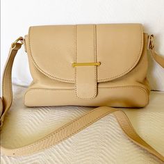 New Without Tags Leather Outer And Strap Cotton Lined Interior Versatile Beige Crossbody Flap Bag, Beige Crossbody Flap Bag With Adjustable Strap, Beige Flap Bag With Adjustable Strap For On-the-go, Beige Crossbody Flap Bag With Removable Pouch, Beige Flap Satchel With Adjustable Strap, Beige Crossbody Flap Bag For Shopping, Beige Satchel Flap Bag For Everyday Use, Beige Flap Satchel For Everyday, Beige Soft Leather Shoulder Flap Bag