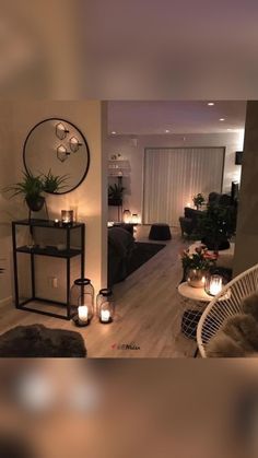 a living room filled with furniture and candles