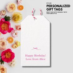 a birthday gift tag with flowers on it