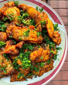 Plate full of cooked chicken thighs with parsley garnished over them Easy Oven Baked Chicken, Oven Baked Chicken Thighs, Chicken Flavors