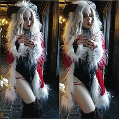 a woman dressed as santa clause taking a selfie