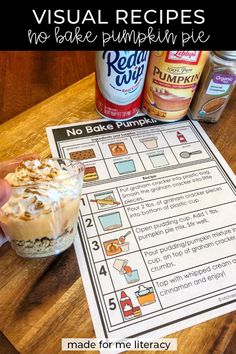 a hand holding a cupcake on top of a wooden table next to a printable pumpkin pie