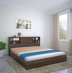 a bed with a wooden headboard and night stand next to a window in a white room