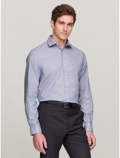 Tommy Hilfiger men's shirt. For work and weekends, our long-sleeve shirt is made from cotton twill blended with THFlex stretch fibers for extra stretch and structure, and cut in a flattering, slim fit.  Material: 96% Cotton - Conventional, 4% Elastane - Conventional. Modern Slim Fit Long Sleeve Dress Shirt, Professional Cotton Work Shirt, Tommy Hilfiger Long Sleeve Work Shirt, Tommy Hilfiger Long Sleeve Shirt For Work, Professional Long Sleeve Cotton Top, Slim Fit Smart Shirt For Office Wear, Slim Fit Long Sleeve Dress Shirt For Business, Slim Fit Long Sleeve Business Dress Shirt, Professional Slim Fit Cotton Shirt